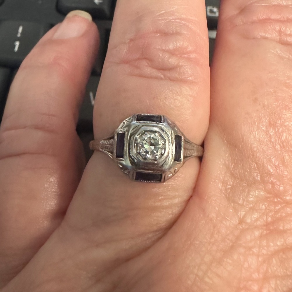 Vintage ring. Real diamond and sapphires.  I’d guess diamond is at least 1/3 ct